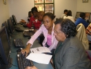 net-literacy-student-volunteers-teaching-at-a-urban-league-computer-lab